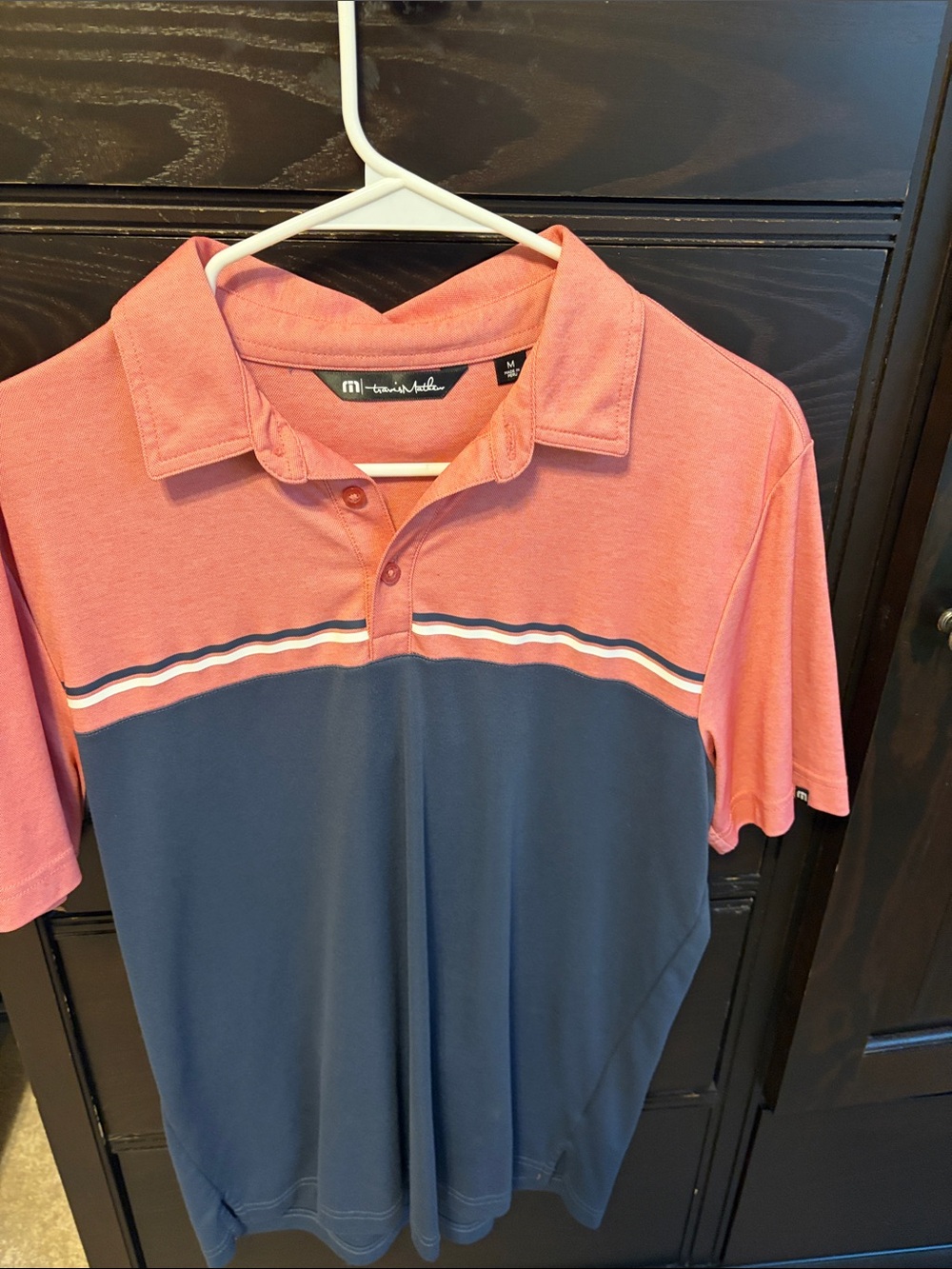 Travis Mathew Two-Tone Coral Pink and Navy Polo